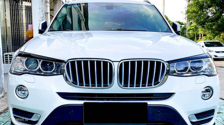 BMW skropstas uz lukturiem